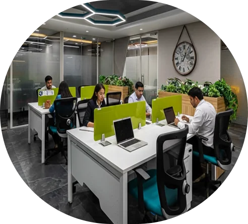 Brainmine team working at desks in a modern office
